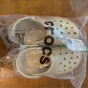 CROCS women’s size 8 - gold sparkle